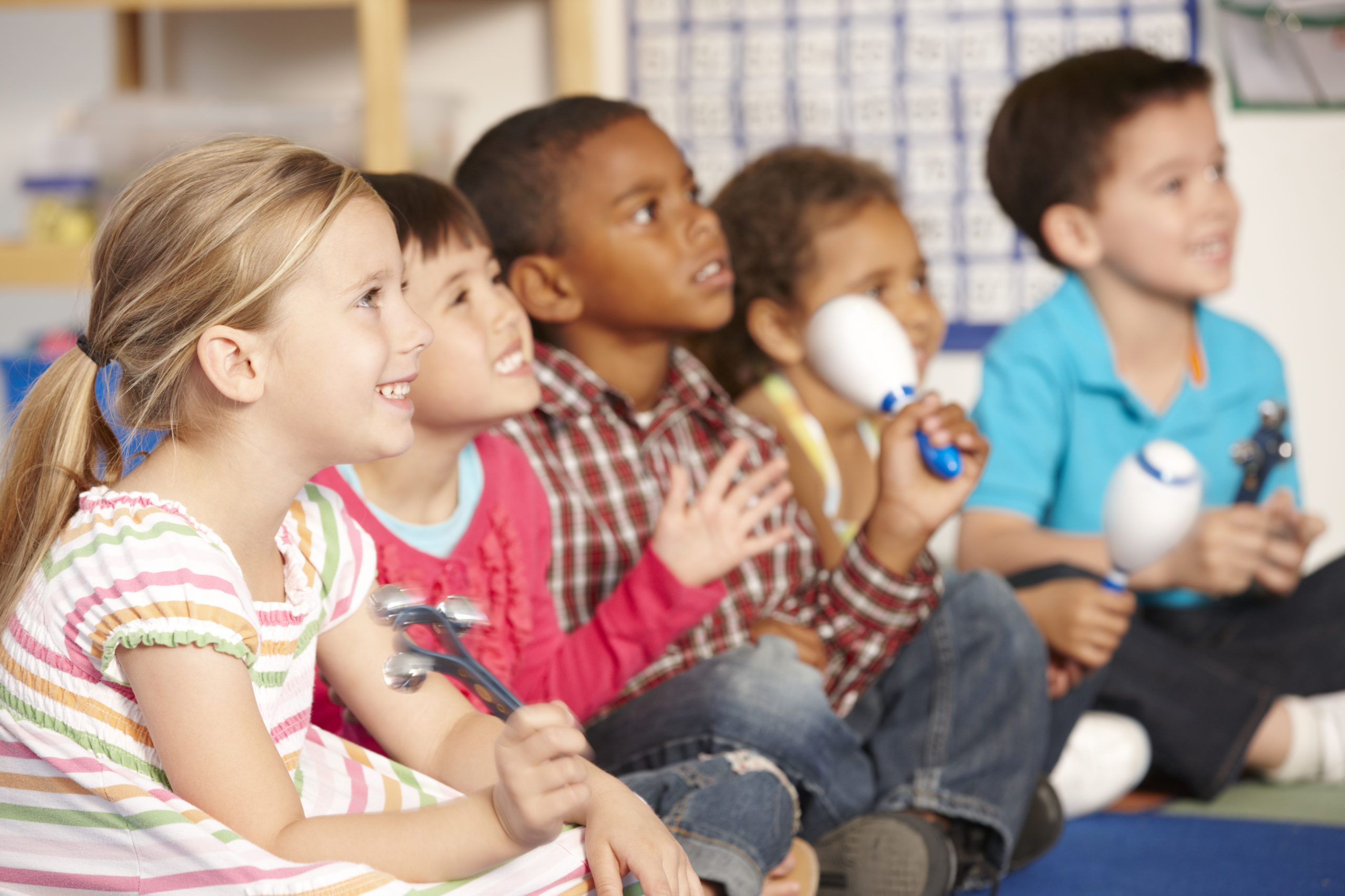 Group,Of,Elementary,Age,Schoolchildren,In,Music,Class,With,Instruments