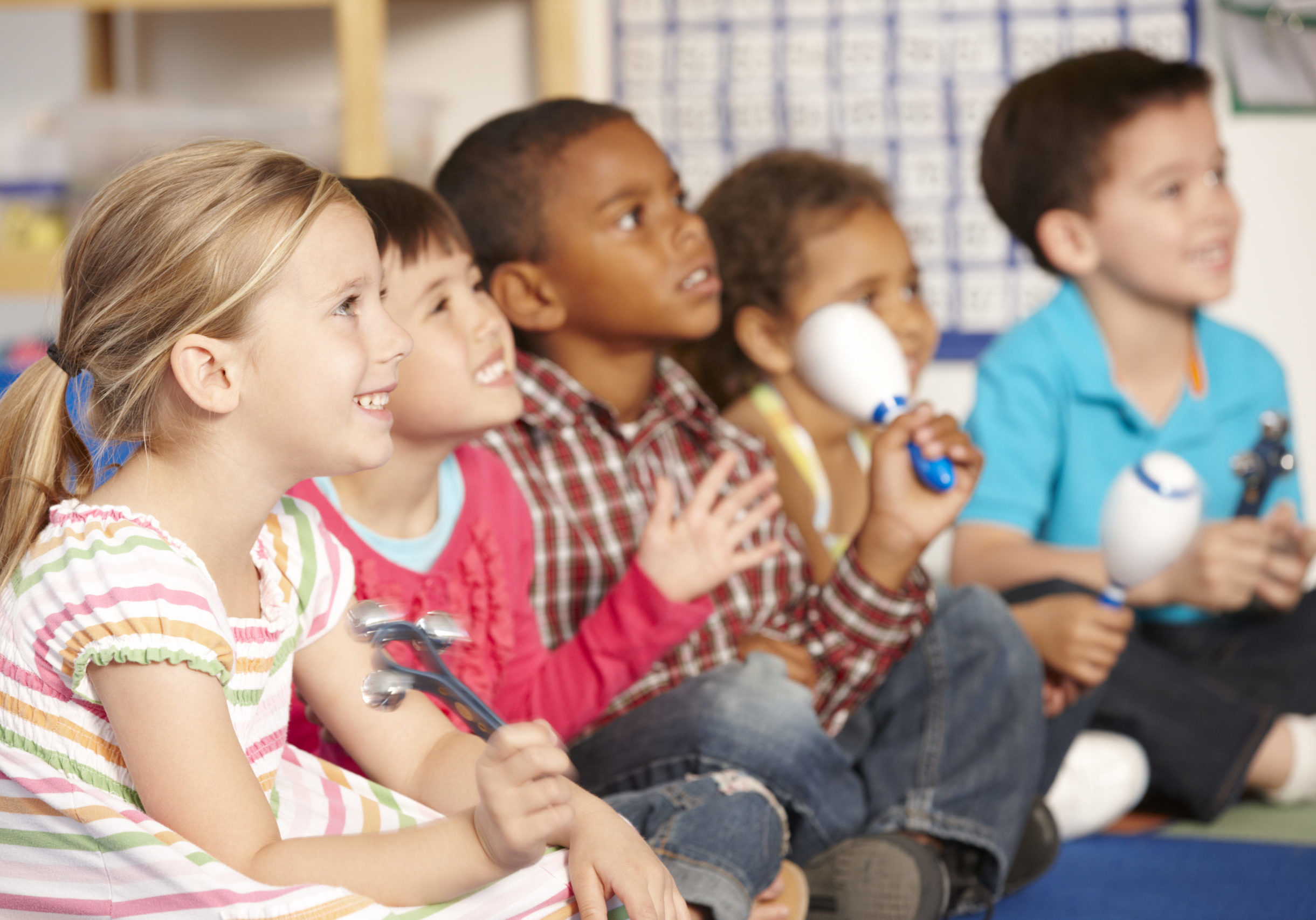 Group,Of,Elementary,Age,Schoolchildren,In,Music,Class,With,Instruments